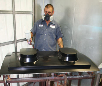 An aircraft window reveal being sprayed in the onsite paint booth.